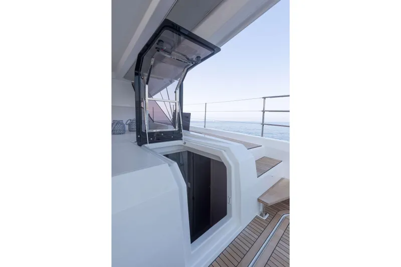  Yacht Photos Pics 2025 Fountaine Pajot Samana 59 yacht deck with open hatch and ocean view.