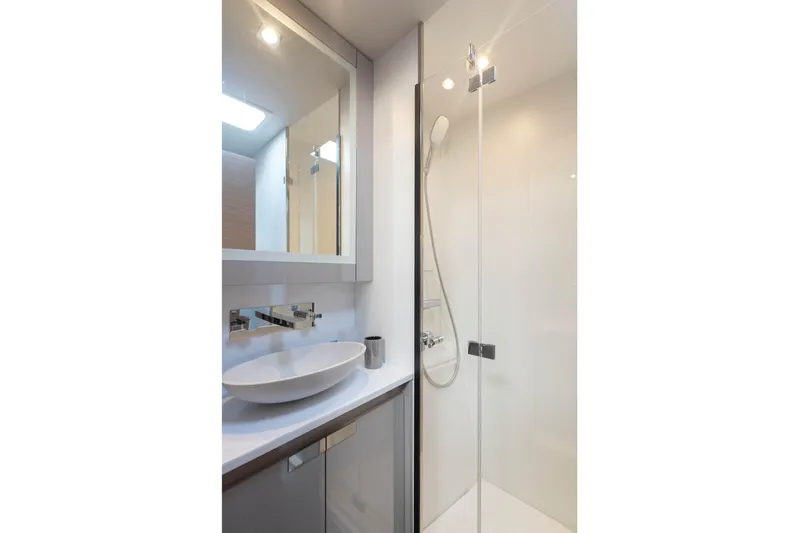  Yacht Photos Pics Modern bathroom in 2025 Fountaine Pajot Samana 59 yacht with sleek shower and basin.