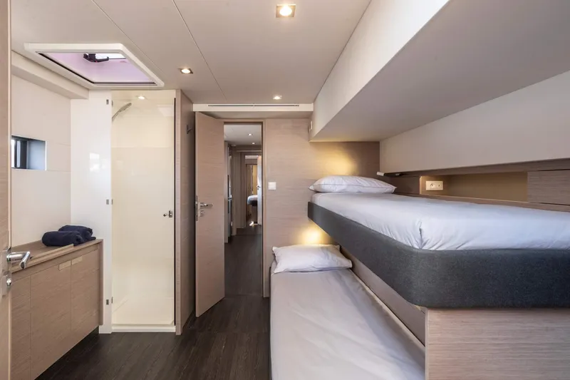  Yacht Photos Pics 2025 Fountaine Pajot Samana 59 yacht interior with bunk beds and modern design.