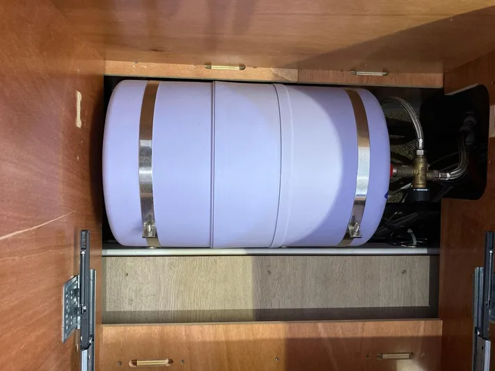 Vela Yacht Photos Pics Water tank inside a 2018 Lagoon 42 yacht, secured with metal straps.