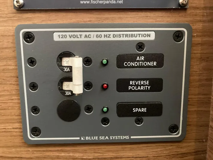 Vela Yacht Photos Pics Electrical panel on a 2018 Lagoon 42, featuring 120V AC distribution and Blue Sea Systems.