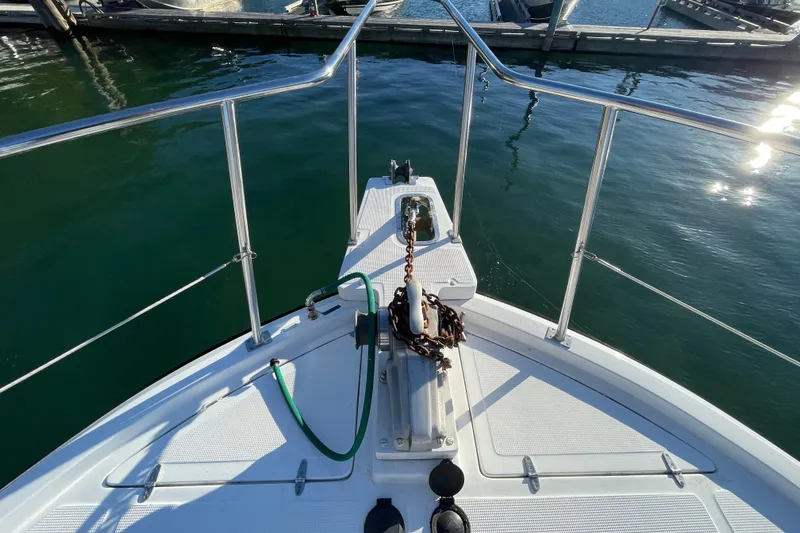 Hasta La Vista Yacht Photos Pics Bow view of 1997 Symbol 48 Sportfish yacht at marina.