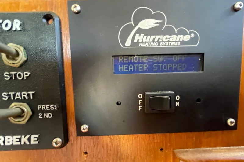 Hasta La Vista Yacht Photos Pics Control panel of Hurricane Heating Systems on 1997 Symbol 48 Sportfish boat.