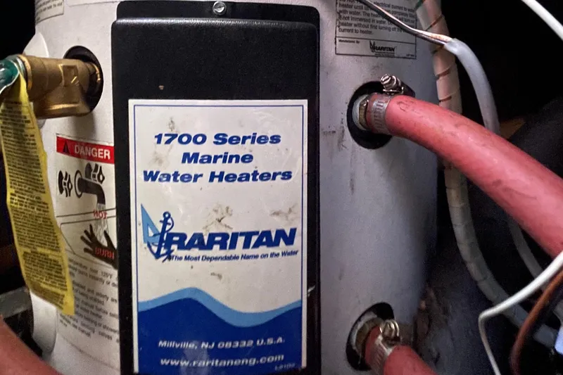 Hasta La Vista Yacht Photos Pics Raritan 1700 Series Marine Water Heater on 1997 Symbol 48 Sportfish boat.