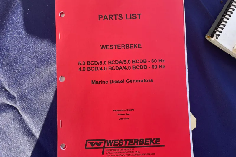Hasta La Vista Yacht Photos Pics Red parts list cover for Westerbeke marine diesel generators, featuring model specifications and publication details.