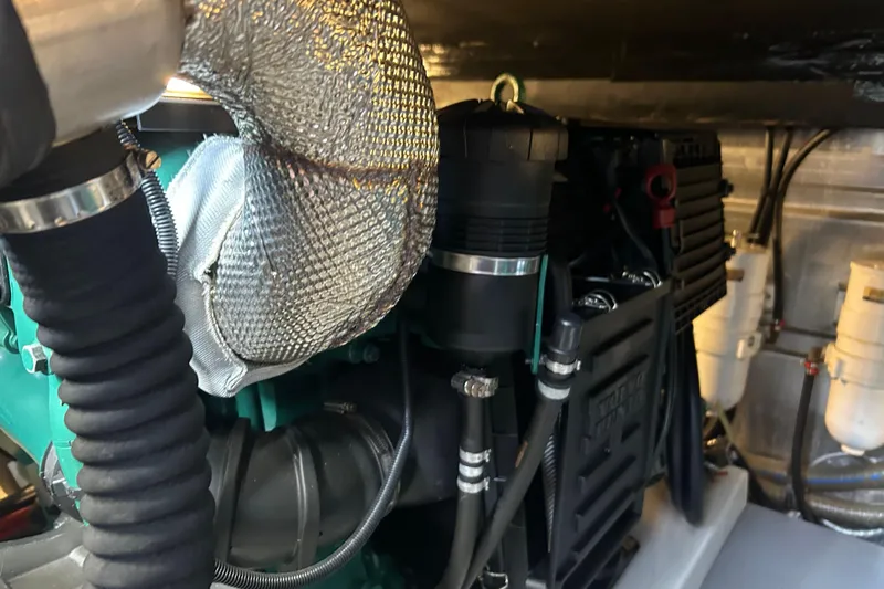  Yacht Photos Pics Engine room of 2018 Beneteau Swift Trawler 44 with visible components and wiring.