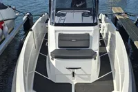2022 Iron 827 T-Top boat docked, featuring sleek design and spacious deck.