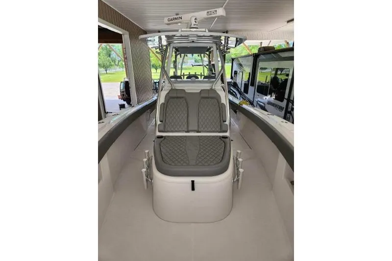  Yacht Photos Pics 2023 Front Runner 36 cc boat interior with cushioned seating and modern design.