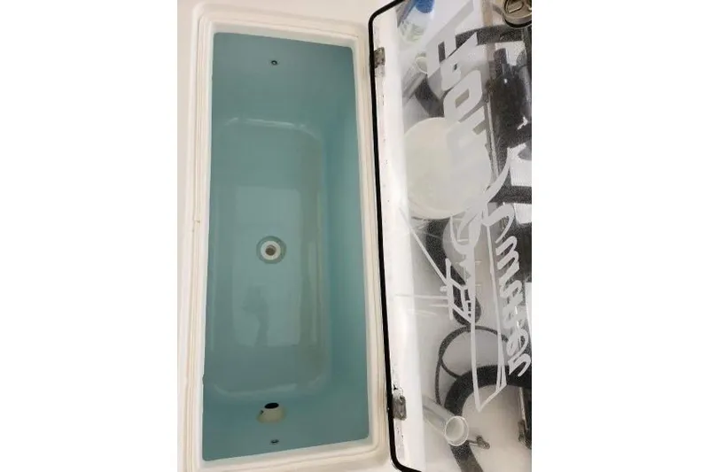  Yacht Photos Pics Open storage compartment of 2023 Front Runner 36 cc boat.