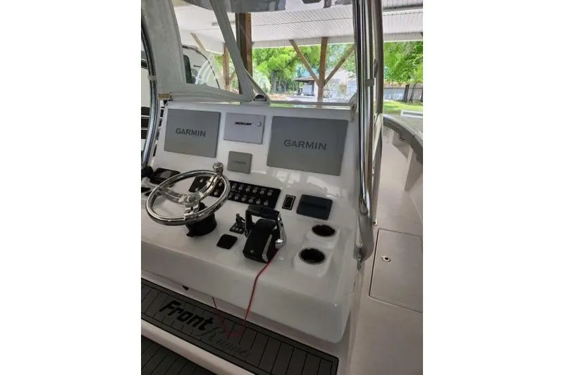  Yacht Photos Pics 2023 Front Runner 36 cc boat dashboard with Garmin navigation displays.