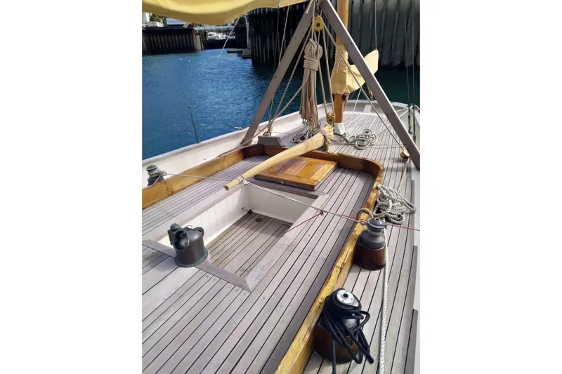 Martha Primrose Yacht Photos Pics Deck of 2012 Custom Mayflower 50 sailboat with wooden finish and nautical equipment.