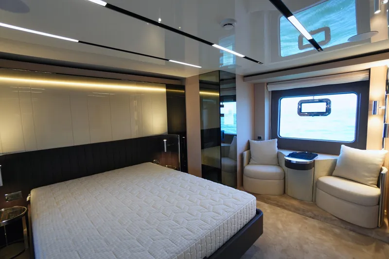 Amy Yacht Photos Pics Luxurious interior of 2023 Cranchi Sessantasette 67 yacht with modern bedroom design.