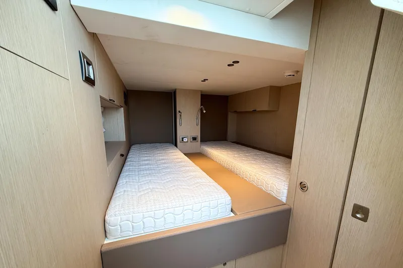 Amy Yacht Photos Pics 2023 Cranchi Sessantasette 67 yacht cabin with twin beds and modern design.