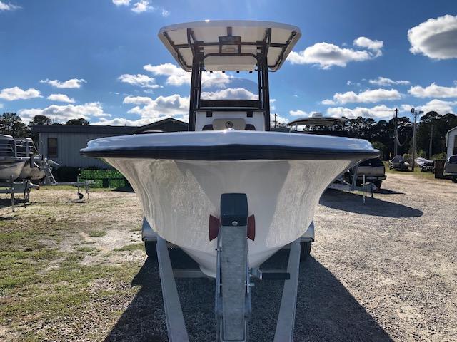 2024 Reflex Gladiator boat on trailer under blue sky.