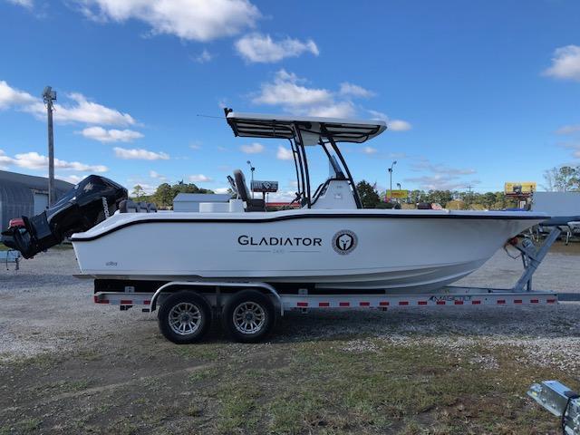 2024 Reflex Gladiator boat on trailer under blue sky.