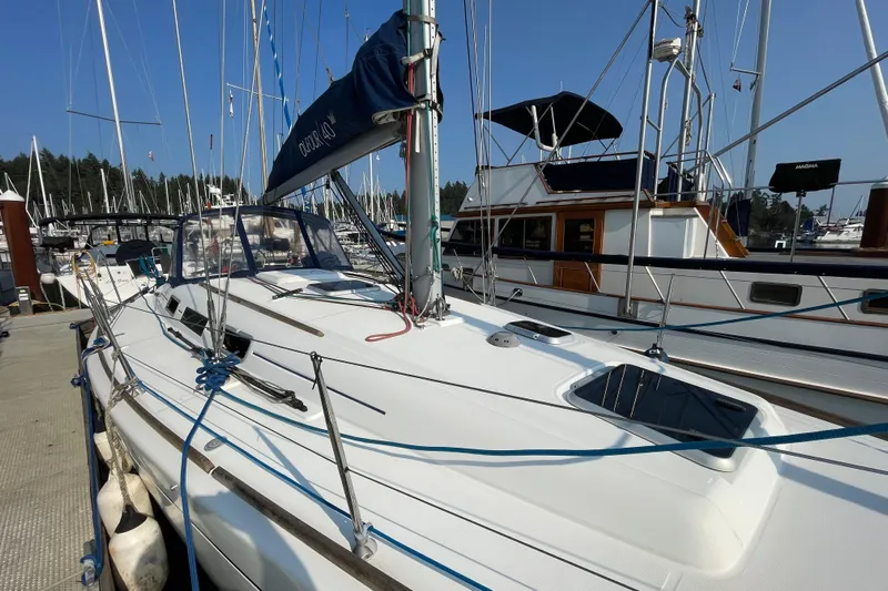 Jaacktak Yacht Photos Pics 2004 Dufour 40 Performance sailboat docked at marina, clear sky background.