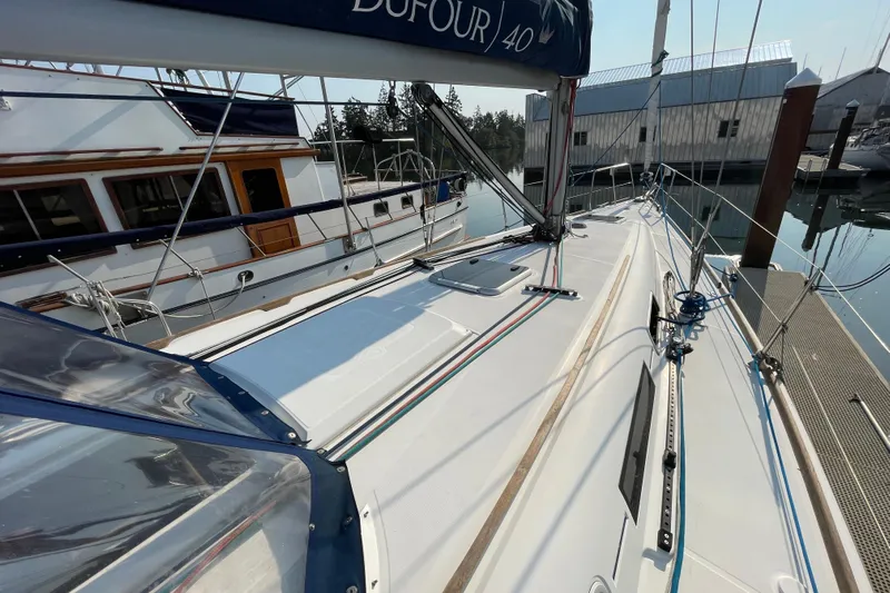 Jaacktak Yacht Photos Pics 2004 Dufour 40 Performance sailboat docked, showcasing sleek deck design and rigging.