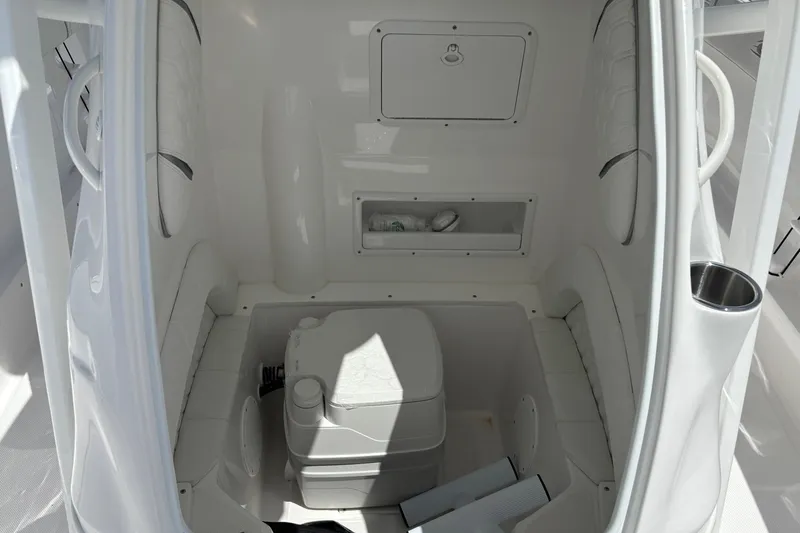  Yacht Photos Pics Interior of 2026 Glasstream 280 Pro-XS boat featuring compact marine toilet.