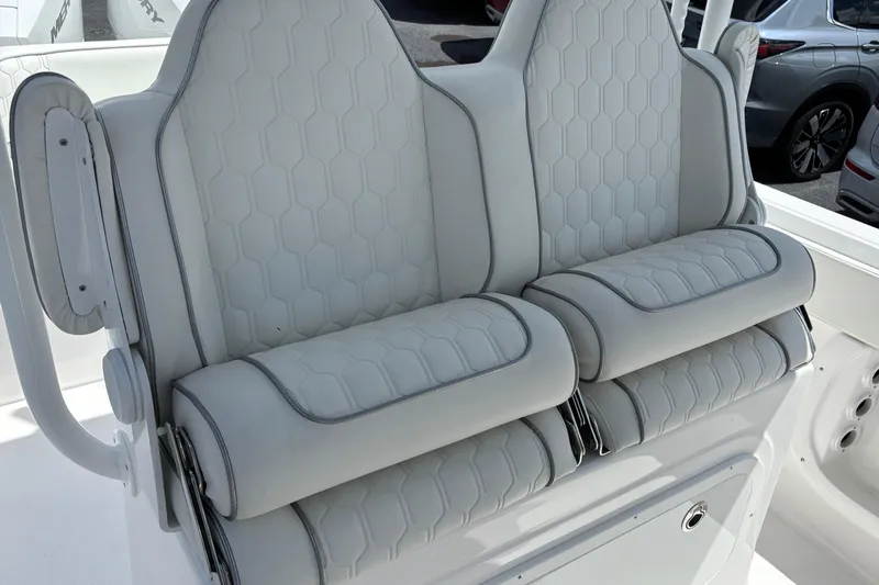  Yacht Photos Pics 2026 Glasstream 280 Pro-XS boat seats with hexagonal pattern and white upholstery.