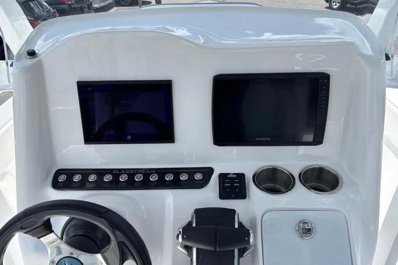 Yacht Photos Pics 2026 Glasstream 280 Pro-XS boat dashboard with dual screens and control panel.