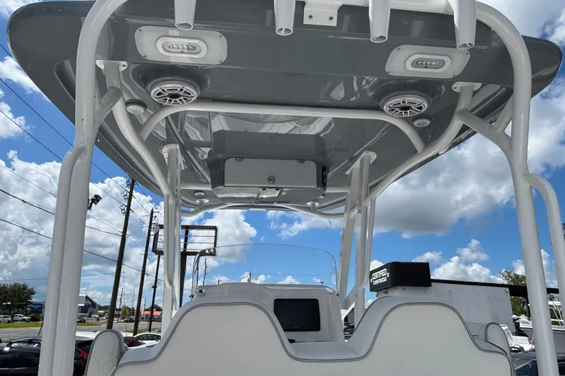  Yacht Photos Pics 2026 Glasstream 280 Pro-XS boat interior with speakers and electronics under a clear sky.