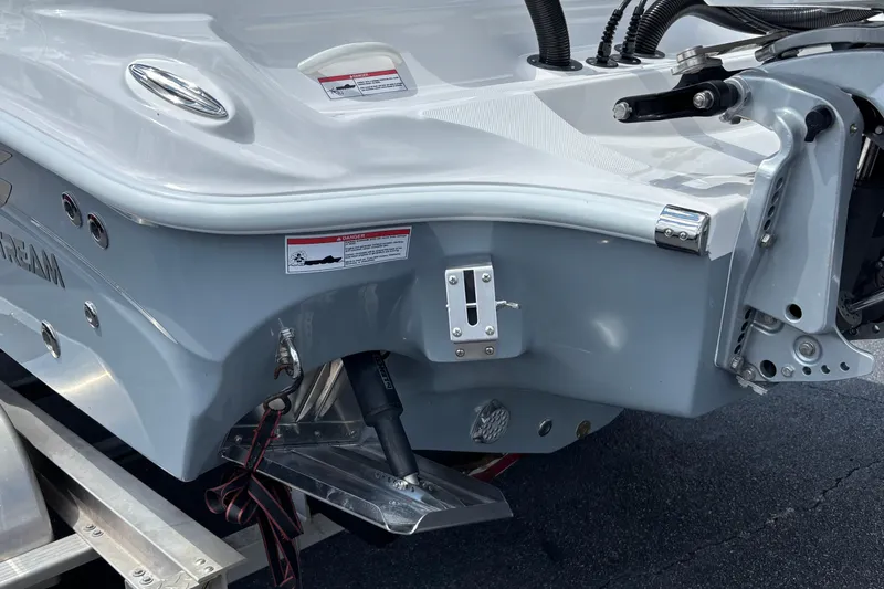  Yacht Photos Pics 2026 Glasstream 280 Pro-XS boat stern detail with hydraulic components and warning labels.