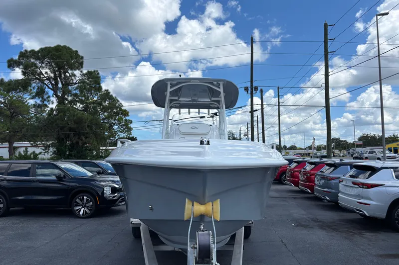  Yacht Photos Pics 2026 Glasstream 280 Pro-XS boat on trailer, parked in lot under blue sky.