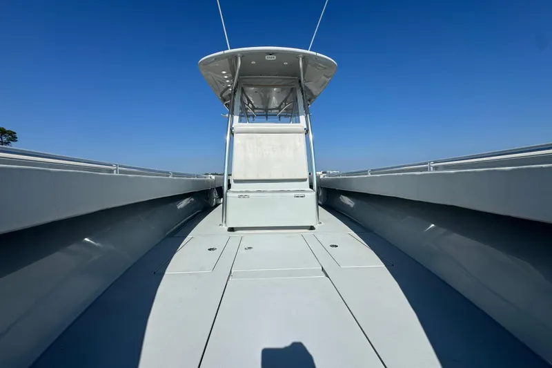 Free Spear It Yacht Photos Pics 2016 Contender 35 ST boat deck under clear blue sky.