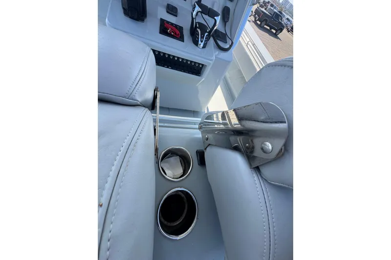 Free Spear It Yacht Photos Pics Interior of 2016 Contender 35 ST boat with cup holders and controls.