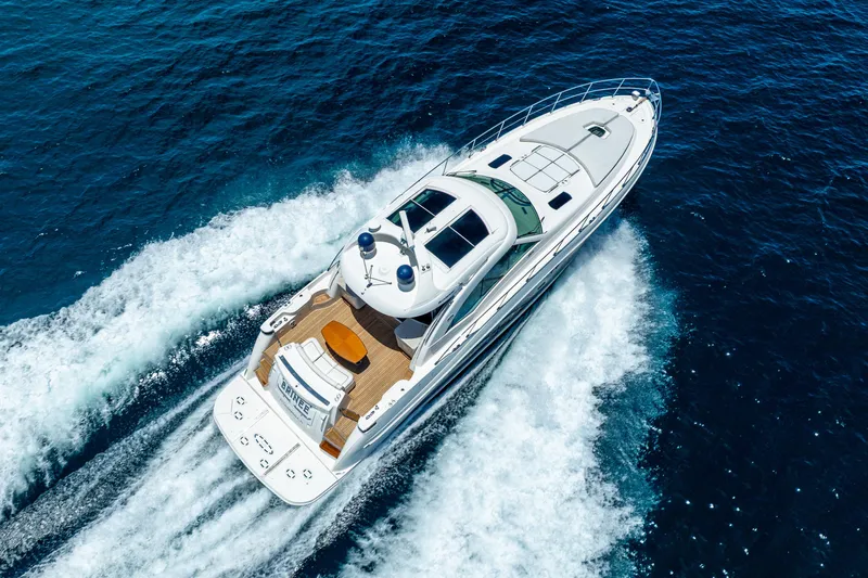 Brinee Yacht Photos Pics 2008 Sea Ray 60 Sundancer yacht cruising on open blue water.