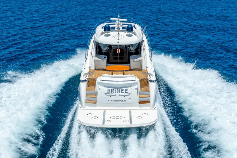 Brinee Yacht Photos Pics 2008 Sea Ray 60 Sundancer yacht cruising on open blue water.