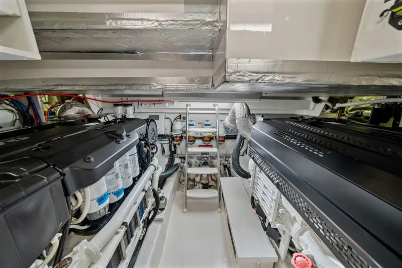 Sapphire Yacht Photos Pics Engine room of 2022 Riviera 575 SUV, showcasing advanced marine machinery and components.