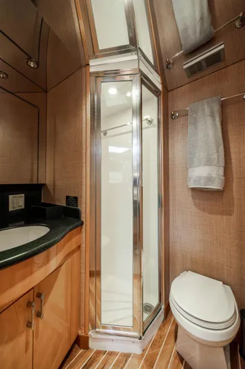 Wet Hooker Yacht Photos Pics Luxurious bathroom in 2003 Hatteras 60 Convertible yacht with shower and modern amenities.