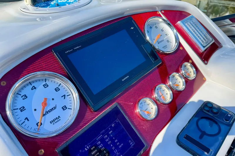  Yacht Photos Pics Dashboard of a 2006 Formula 382 FASTech boat with gauges and Garmin display.