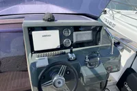 Helm of 2012 Fjord 36' Open boat with Simrad navigation system.