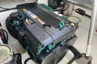 Engine compartment of a 2012 Fjord 36' Open boat, showcasing a well-maintained motor.