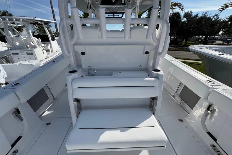  Yacht Photos Pics 2026 Sportsman Open 302 Center Console boat interior with seating and storage.
