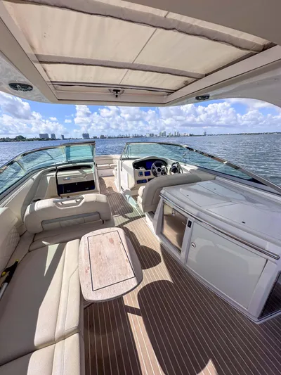 Poly Yacht Photos Pics 2019 Regal 33 OBX boat interior with spacious seating and modern amenities on open water.