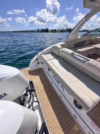 Poly Yacht Photos Pics 2019 Regal 33 OBX boat with Yamaha engines, docked in Miami, FL, on a sunny day.