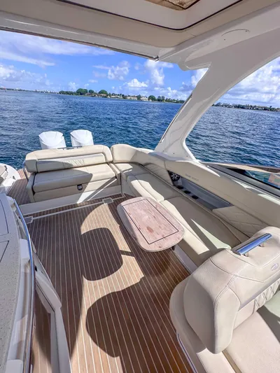 Poly Yacht Photos Pics 2019 Regal 33 OBX yacht interior with luxurious seating and ocean view.