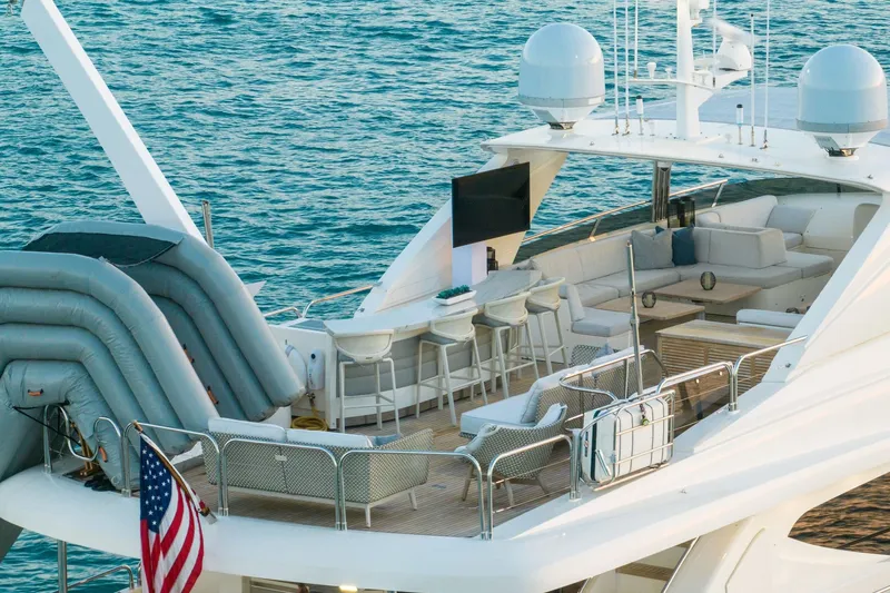 Current Sea Yacht Photos Pics Luxurious 2011 Princess 95 yacht with spacious deck, seating, and ocean view.