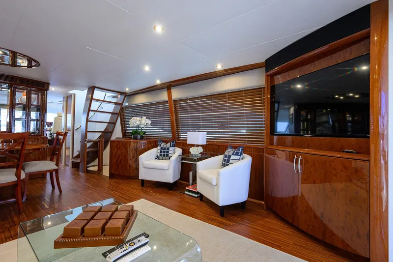 Time Off V Yacht Photos Pics Luxurious interior of 2005 Lazzara 68 Enclosed Bridge yacht with elegant furnishings.