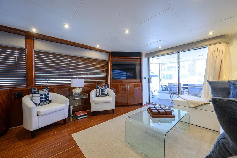 Time Off V Yacht Photos Pics Luxurious interior of 2005 Lazzara 68 Enclosed Bridge yacht with modern furnishings.
