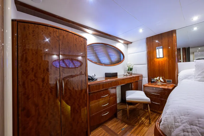 Time Off V Yacht Photos Pics Luxurious cabin interior of 2005 Lazzara 68 Enclosed Bridge yacht with elegant wood finishes.