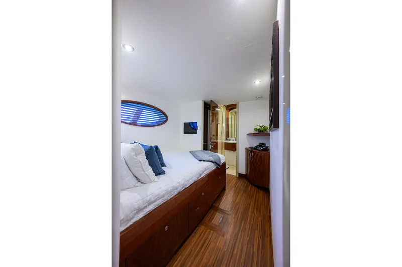 Time Off V Yacht Photos Pics Luxurious cabin interior of 2005 Lazzara 68 Enclosed Bridge yacht with modern decor.