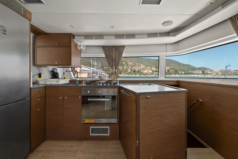  Yacht Photos Pics Modern kitchen interior on 2018 Lagoon 52 F yacht with scenic window views.