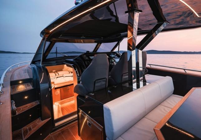 Luxurious 2025 Focus Forza 37 yacht interior at sunset, featuring sleek design and modern amenities.