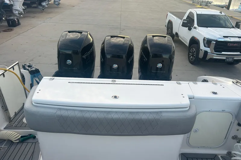  Yacht Photos Pics 2007 Fountain 38 Sportfish Cruiser OB with four outboard engines at a dock.