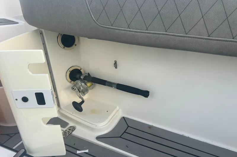 Yacht Photos Pics 2007 Fountain 38 Sportfish Cruiser OB interior detail with fishing rod holder.