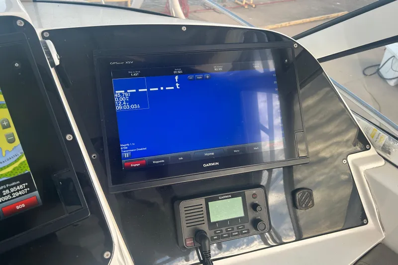  Yacht Photos Pics Garmin GPS display on 2007 Fountain 38 Sportfish Cruiser OB boat dashboard.